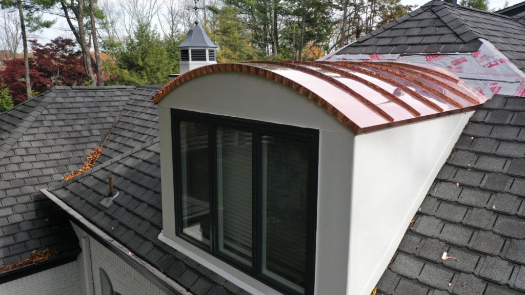 Image of curved copper standing seam roof Installed by Alte Exteriors Roofing Company Morristown NJ