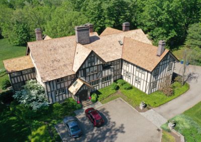 Gracious Tudor home with new cedar shake roof and Velux skylights