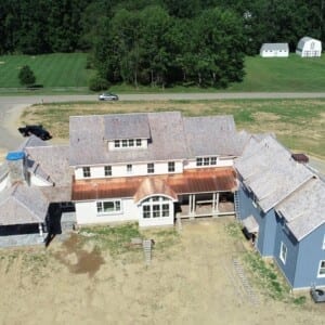Cedar roof replacement – Custom made lower copper roofs