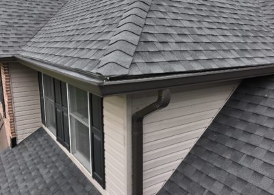 A after image of a home with seamless gutters installed by Alte Exteriors. Gutter Color Dark Bronze